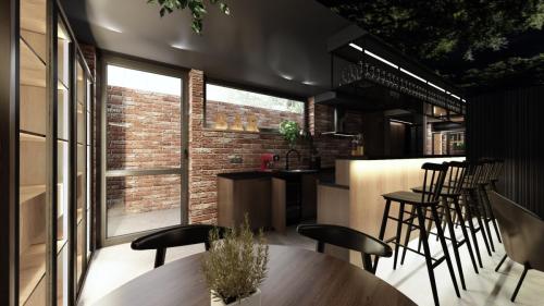 NOWOCZESNY KLUB Z SUFITEM PODWIESZANYM I CEGŁĄ