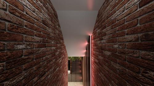 NOWOCZESNY KLUB Z SUFITEM PODWIESZANYM I CEGŁĄ