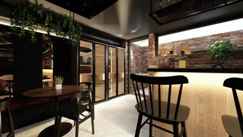 NOWOCZESNY KLUB Z SUFITEM PODWIESZANYM I CEGŁĄ